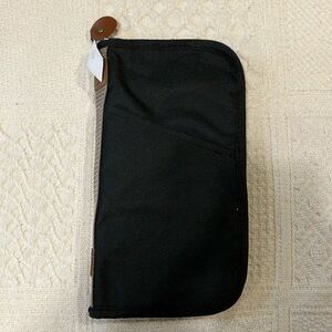 NEW. R-bag black canvas zippered wallet. 5”x10”